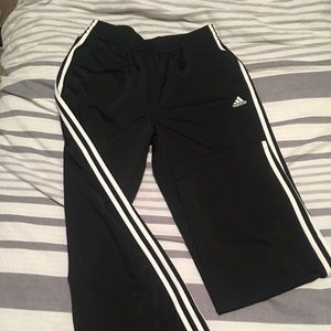 Black and white adidas warm up pants